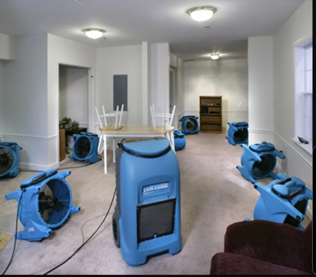 Air movers and dehumidifier setup for Water Extraction & Removal in Huron